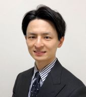 アドバイザー足立亮二の写真